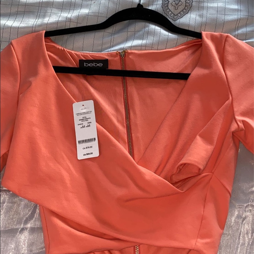 Brand new wrap Bebe top!